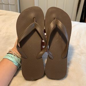 Women’s brown flip flops with wedge